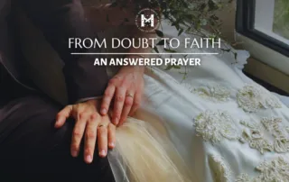 Bride and groom hands on wedding day.