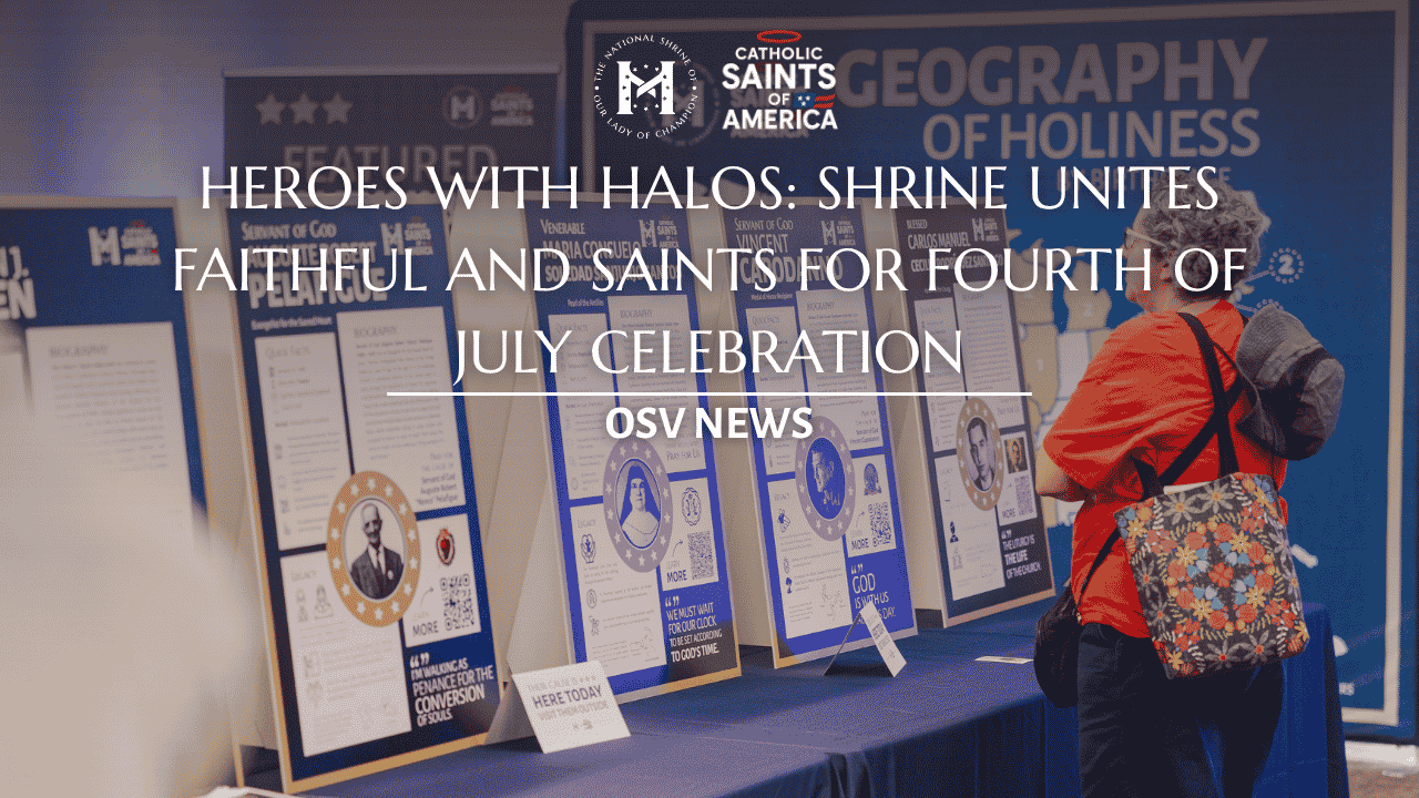 Lady looking at boards for Catholic Saints of America Event